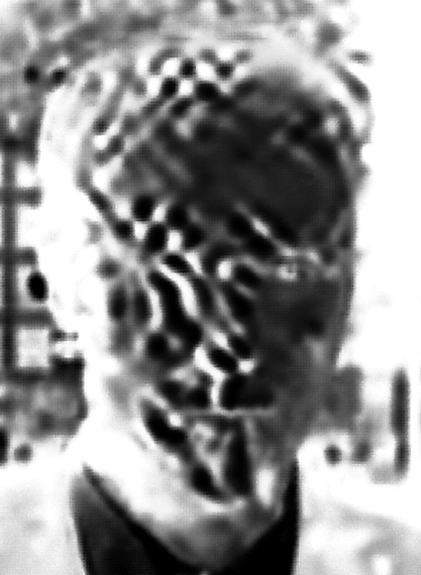 Rob Olson frame 02"33 Inverted and desaturated